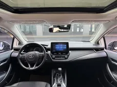 2021 Toyota Corolla 1.5L CVT Elite, белый — фото 12