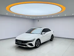 2023 Hyundai Elantra 1.5L CVT LUX Premium, белый — фото 1
