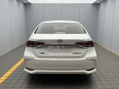 2021 Toyota Corolla 1.5L CVT Elite CARE, белый — фото 5