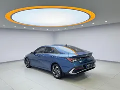2023 Hyundai Elantra 1.5L CVT LUX Premium, синий — фото 4