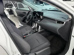 2023 Toyota Corolla Cross 2.0L CVT Elite, белый — фото 7