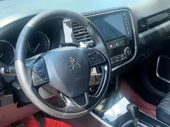 2021 Mitsubishi Outlander 2.4L 4WD 7-seat, белый — фото 8
