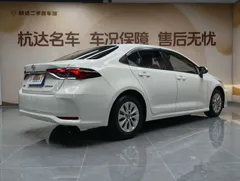 2021 Toyota Corolla 1.5L CVT Elite, белый — фото 6