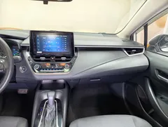 2021 Toyota Corolla 1.5L CVT Elite, белый — фото 10
