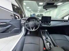2021 Toyota Corolla 1.5L CVT Elite, белый — фото 14
