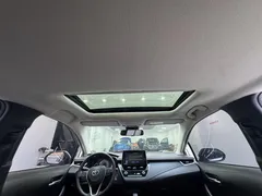 2021 Toyota Corolla 1.5L CVT Elite, белый — фото 16