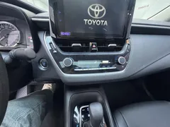2021 Toyota Corolla 1.5L CVT Elite, белый — фото 20