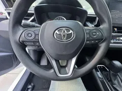 2021 Toyota Corolla 1.5L CVT Elite, белый — фото 23
