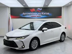 2021 Toyota Corolla 1.5L CVT Elite, белый — фото 1
