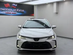 2021 Toyota Corolla 1.5L CVT Elite, белый — фото 2