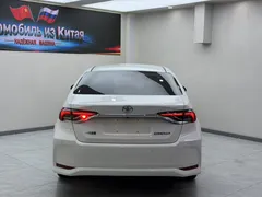 2021 Toyota Corolla 1.5L CVT Elite, белый — фото 4