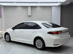 2021 Toyota Corolla 1.5L CVT Elite, белый — фото 5