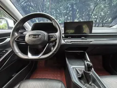 2023 Geely Emgrand 4th Gen Champion 1.5L MT Luxury, белый — фото 11