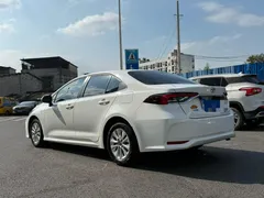 2021 Toyota Corolla 1.5L CVT Elite, белый — фото 6