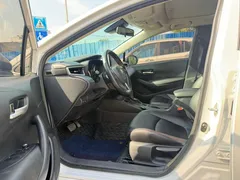 2021 Toyota Corolla 1.5L CVT Elite, белый — фото 7