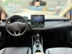 2021 Toyota Corolla 1.5L CVT Elite, белый — фото 8