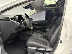 2021 Toyota Corolla 1.5L CVT Elite, белый — фото 5