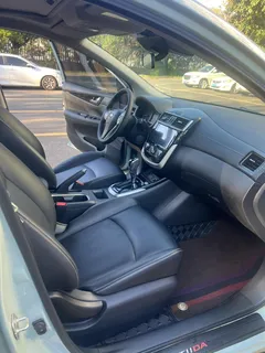 2023 Nissan Tiida 1.6L CVT, зелёный — фото 11