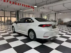 2021 Toyota Corolla 1.5L CVT Elite, белый — фото 6