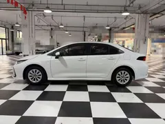 2021 Toyota Corolla 1.5L CVT Elite, белый — фото 8