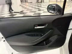 2021 Toyota Corolla 1.5L CVT Elite, белый — фото 14