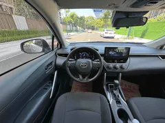 2023 Toyota Corolla Cross 2.0L CVT Pioneer, белый — фото 17