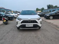 2021 Toyota RAV4 2.0L CVT 4WD Premium, белый — фото 2