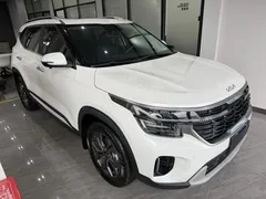 2023 Kia Seltos 1.5L IVT Luxury, белый — фото 1