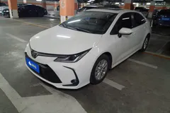 2021 Toyota Corolla 1.5L CVT Elite, белый — фото 1