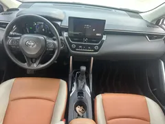 2023 Toyota Corolla Cross 2.0L CVT Elite, белый — фото 8