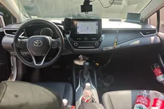 2021 Toyota Corolla 1.5L CVT Elite, белый — фото 13