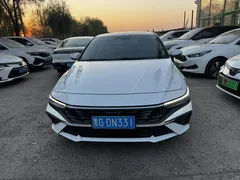2023 Hyundai Elantra 1.5L CVT LUX Premium, белый — фото 1