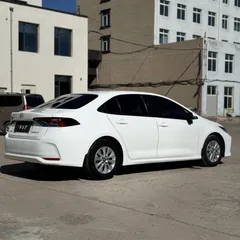 2021 Toyota Corolla 1.5L CVT, белый — фото 6