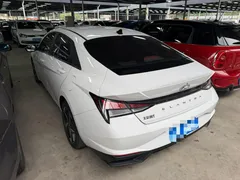 2022 Hyundai Elantra 1.5L CVT LUX Black Knight Limited Edition, белый — фото 12