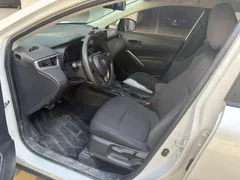 2023 Toyota Corolla Cross 2.0L CVT Elite, белый — фото 4