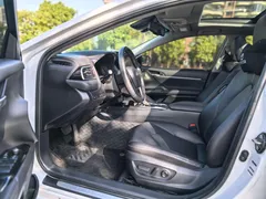 2021 Toyota Camry 2.5G Luxury, белый — фото 15