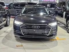 2022 Audi A8L 50 TFSI quattro, чёрный — фото 2