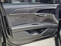 2022 Audi A8L 50 TFSI quattro, чёрный — фото 7
