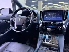 2020 Toyota Alphard Hybrid 2.5L Premium, белый — фото 16