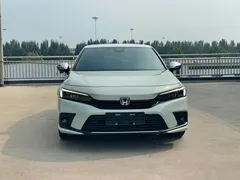 2023 Honda Civic 2.0L e:HEV, зелёный — фото 2