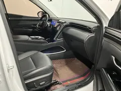 2023 Hyundai Tucson L 1.5T AT 2WD LUX Premium, белый — фото 20