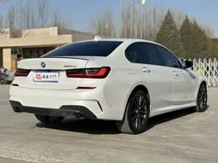 2022 BMW 3 Series 325Li M Sport Dark Package, белый — фото 7