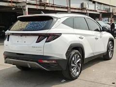 2021 Hyundai Tucson L 1.5T DCT GLX Elite, белый — фото 19