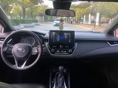 2021 Toyota Levin Hybrid 1.8H E-CVT Luxury, белый — фото 15