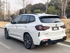 2022 BMW X3 xDrive30i M, белый — фото 14