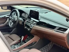 2022 BMW X2 sDrive25i M, белый — фото 21