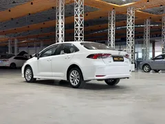 2021 Toyota Corolla 1.2T S-CVT Pioneer, белый — фото 6