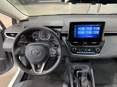 2021 Toyota Corolla 1.2T S-CVT Pioneer, белый — фото 15