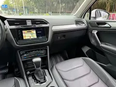 2021 Volkswagen Tiguan L 430PHEV PHEV Premium, белый — фото 9