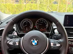 2021 BMW 1 Series 1 125i M, синий — фото 20